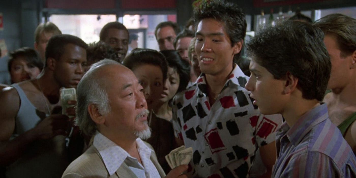 Mr Miyagi looks at Daniel and Chozen insults him.