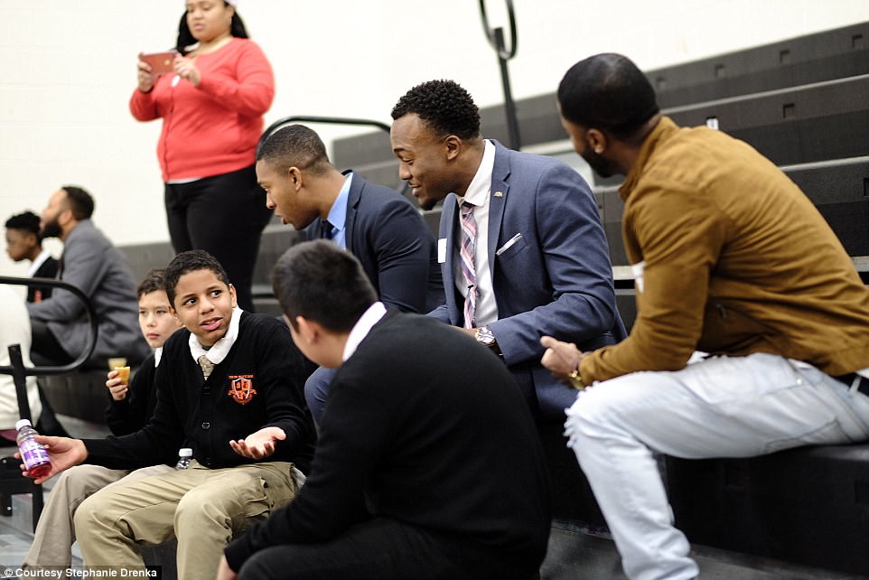These three men were paired with a group of three young students 