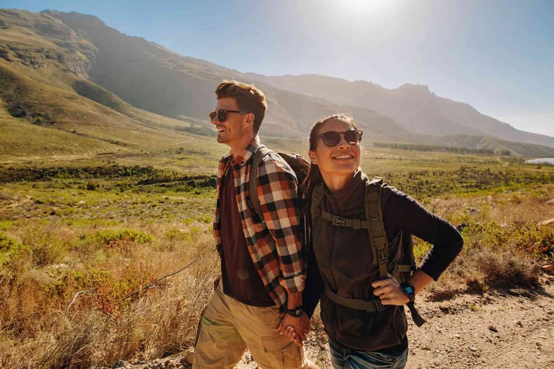 Happy-couple-on-hiking-trail-in-nature-reserve-how-to-become-smarter